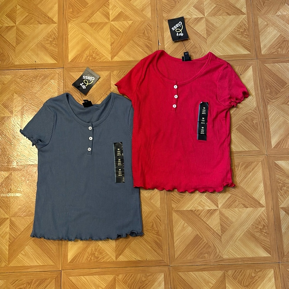 Kids medium target tops! They are buttoned and have cute ridges.